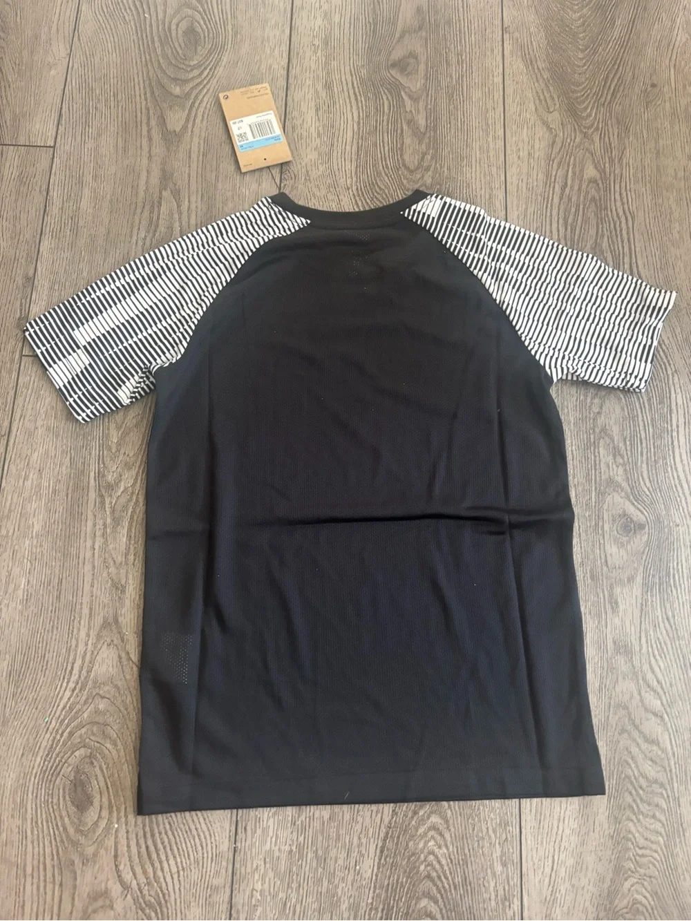 Nike Black Short-Sleeve Athletic Tee with Striped White Sleeves